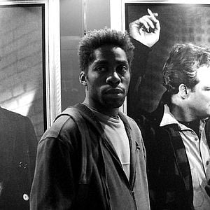 Foto Cobrador: In God We Trust