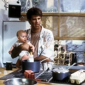 Foto Tres hombres y un bebé