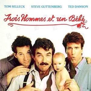 Foto Tres hombres y un bebé