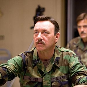 Foto Los hombres que miraban fijamente a las cabras