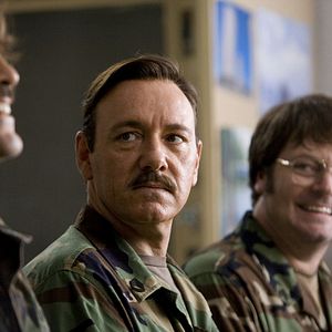 Foto Los hombres que miraban fijamente a las cabras