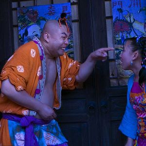 Foto Una mujer, una pistola y una tienda de fideos chinos