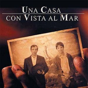 Foto Una casa con vista al mar