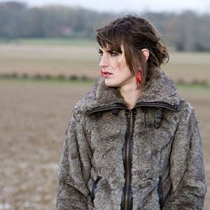 Foto Una puta y un pollo