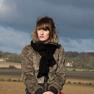 Foto Una puta y un pollo