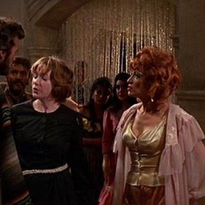 Foto Dos mulas y una mujer