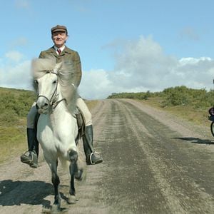 Foto De caballos y hombres
