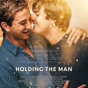 Foto Holding The Man