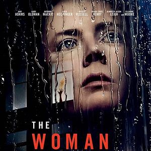 Foto La mujer en la ventana