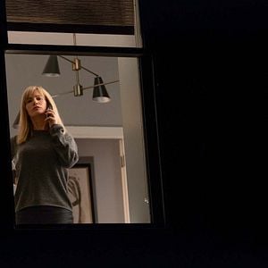 Foto La mujer en la ventana