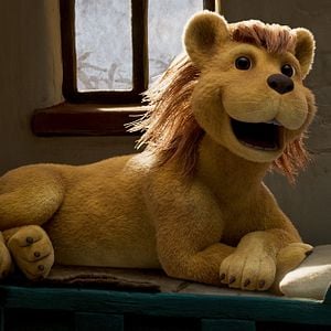 Foto Tres ladrones y un león