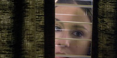 Cartel de Posible sospechosa