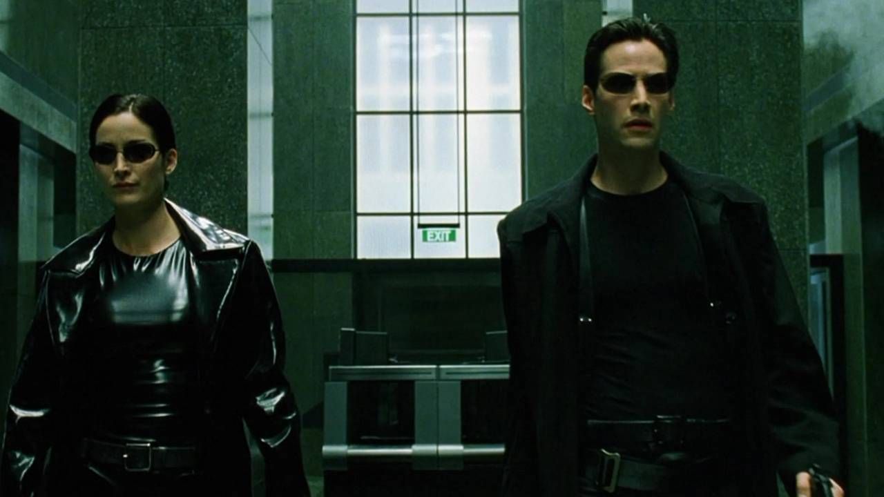 Carrie Anne-Moss y Keanu Reeves como Trinity y Neo en 'Matrix'