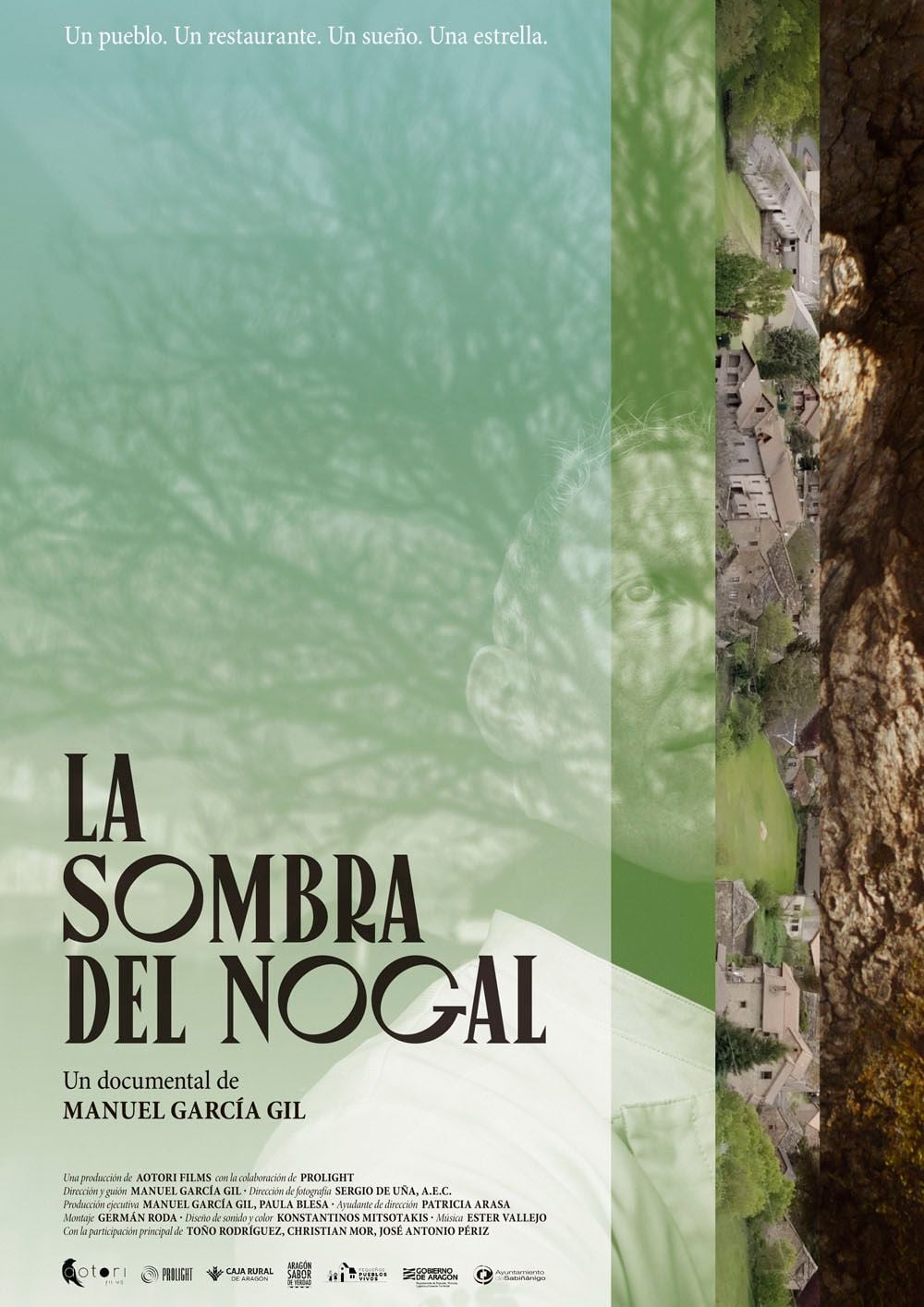 Fotograma de La sombra del nogal mostrando el restaurante La Era de los Nogales en el Pirineo aragonés con un nogal centenario al fondo