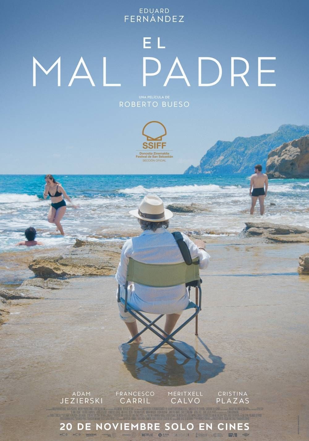 Un póster de la película El mal padre, mostrando a un hombre mayor y sus hijos en un ambiente familiar, quizás en la casa costera.
